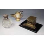 A brass pieced ink stand; a silver topped scent bottle;