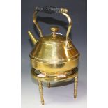 An Arts and Crafts brass tea kettle, designed by Matthew J Hart and Sons, Birmingham,