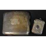 A silver cigarette case, Birmingham 1946; a silver vesta case,