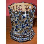 A Doulton Lambeth salt glazed stoneware basket ware pierced openwork jardiniere on stand,