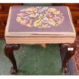 A George III style mahogany stool, cabriole legs carved and applied to the knees with bell husks,