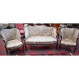 A Victorian mahogany three piece salon suite comprising sofa and a pair of chairs,