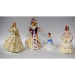 A Royal Doulton figure, Lady Doulton 1995, Lilly, HN3626; another, Andrea, HN3058,