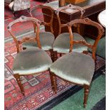 A set of four Victorian mahogany dining chairs,