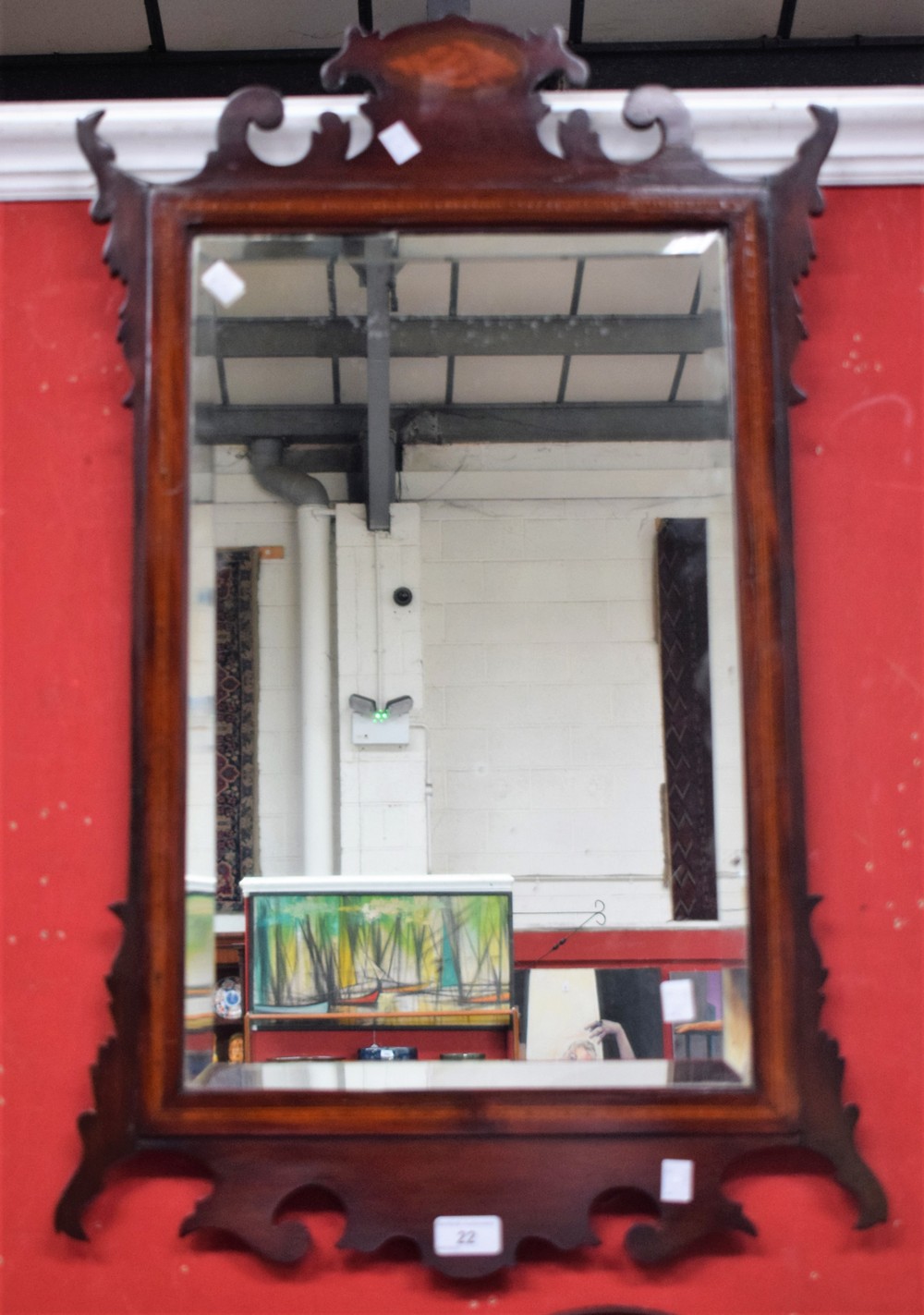 A George III style Edwardian mahogany mirror, inlaid shell motif,