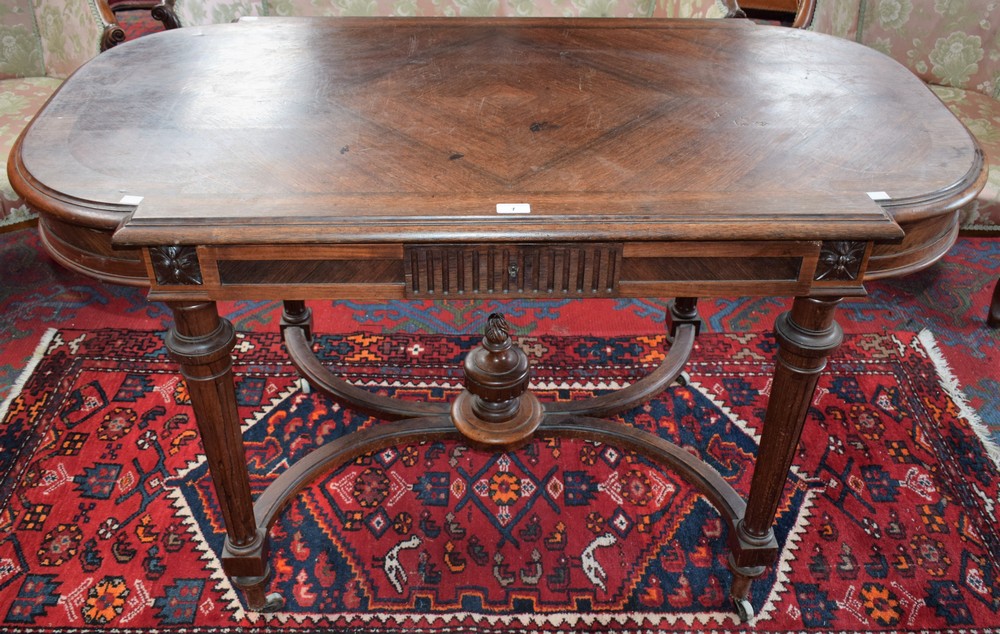 A 19th century bowed rectangular library table,