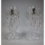 A pair of Waterford cut glass crystal table lustres, each with ten faceted droplets,
