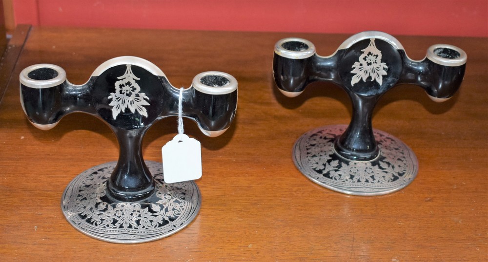 A pair of Rockwell glass two branch table candlesticks,