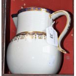 An early 19th century Derby ale jug, blue and gilt border, puce marks to base, approx 17.