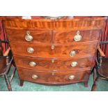 An early Victorian flame mahogany bow-front chest of two short over three long graduated cockbeaded