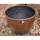 A 19th century riveted copper log/coal bucket, brass carry handles, lion paw feet, stamped A&L,