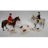 A Beswick mounted Huntsman on chestnut horse; others, similar, a Huntswoman,