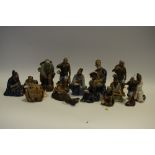 Various Chinese terracotta figural groups;