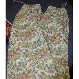 A pair of lined curtains, floral decoration. 183cm wide x 208cm fall.