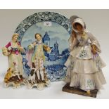 A 19th century plate decorated with river scene gallant and girl along with a figure of a lady