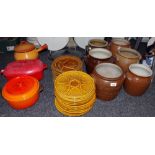 Various Le Crueset type saucepans; storage jars; fondue plates,