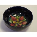 A small Moorcroft bowl, Columbine pattern 8cm diameter.