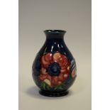 A Moorcroft Anemone pattern baluster shaped vase,