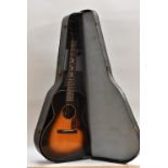 A 1930's Kalamazoo KG-11 six string Acoustic Guitar by Gibson, sunburst finish,