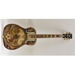 An Ozark Resonator Guitar, engraved nickel-plated solid brass body,