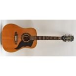 An Eko Ranger twelve string acoustic guitar, having a fine spruce soundboard, Ivorine Binding,