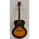 An Enigma Guitars Inc. six string Acoustic Guitar, model no. JBS-404, sunburst finish.