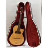 An Ozark 3513 six string acoustic 'Jazz' Guitar.