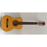 A Landola Classical Acoustic Guitar, very well-figured soundboard, mahogany sides and back,