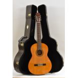 A Yamaha CG-100 Classical Guitar, complete with case.