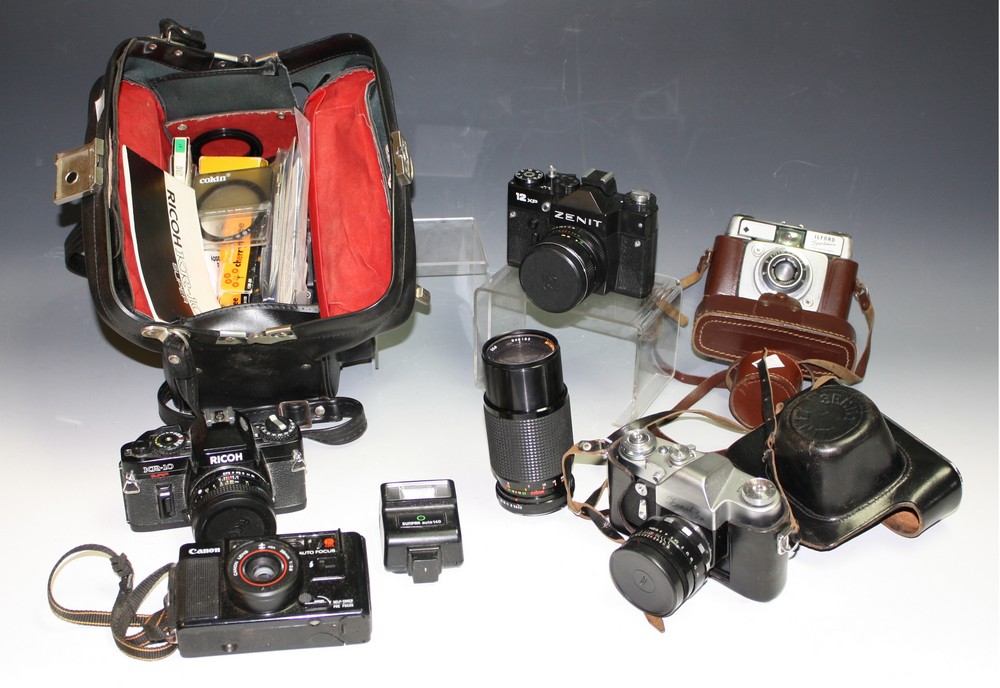 Photographic Equipment - a Zenit SLR camera,