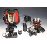 Photographic Equipment - a Zenit SLR camera,