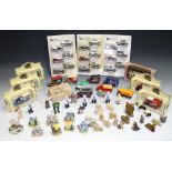 A collection of Wade Whimsies; die-cast model cars and vans, Lledo, Readers Digest,