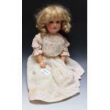 An Armand Marseille bisque head doll, sleeping blue eyes, open mouth, blond wig, impressed marks,