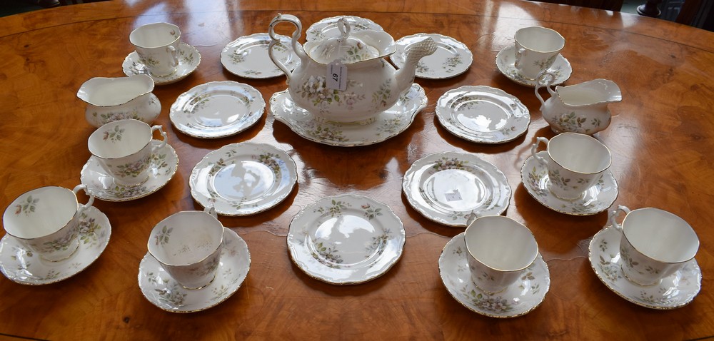 A Royal Albert Haworth pattern tea service, for eight, comprising large teapot, cups, saucers,