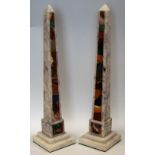 A pair of pietra dura obelisks, inlaid with lapis lazuli, malachite and other specimen stones,