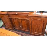 A Victorian mahogany inverted break centre sideboard,