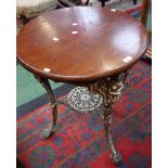 A Victorian Biclam Abolitionist pub table, stepped circular top, cast frame moulded with lion masks,