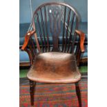 A Country house Windsor chair, pierced splat, serpentine arms, curved arm posts, elm seat,