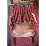 A Country house Windsor chair, pierced splat, serpentine arms, curved arm posts, elm seat,
