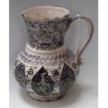 A Middle Eastern tin glazed earthenware baluster jug,