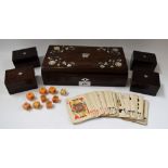 A 19th century rosewood and mother of pearl marquetry domed rectangular playing card box,