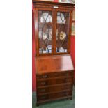 A reproduction mahogany bureau bookcase,