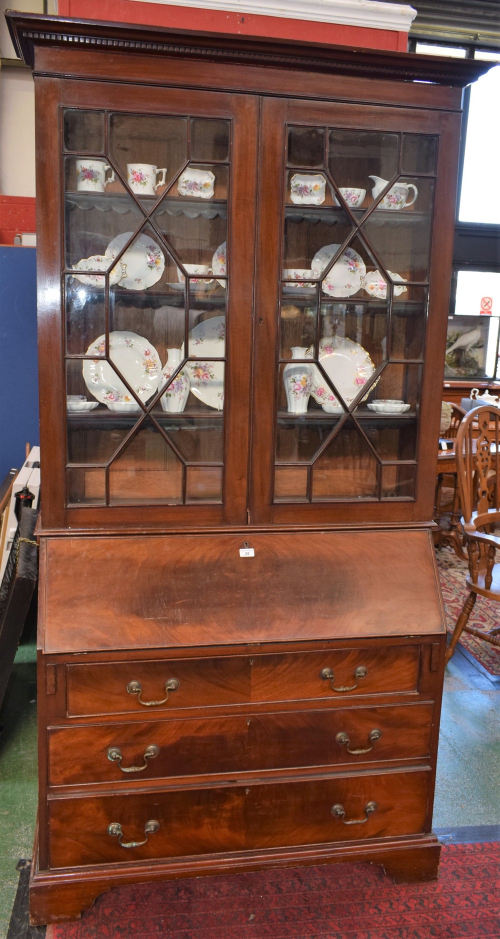 A George III style mahogany bureau bookcase,