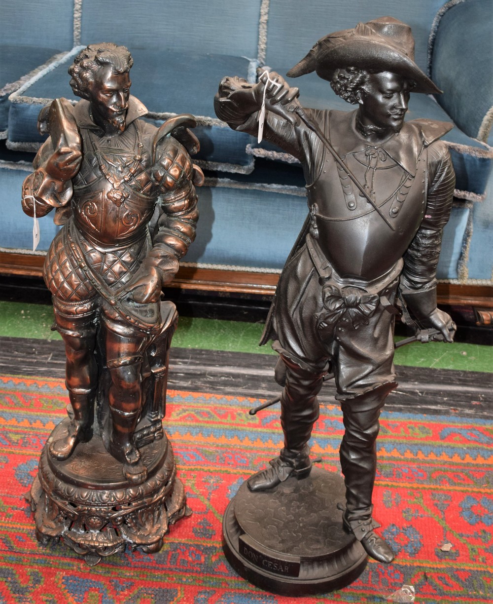 A large cast metal figure, labelled Don Cesar, 90cm high; another,