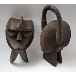 Tribal Art - a Chamba bovid mask, of stylised geometric form, curved horn cresting,