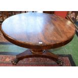 A 19th century rosewood centre table, circular top above a deep frieze,