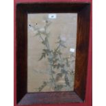 An Arts and Crafts needlework, butterflies on thistles, oak framed,