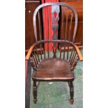 A Country house Windsor elbow chair, pierced splat, turned arm posts, ring turned legs, H-stretcher,