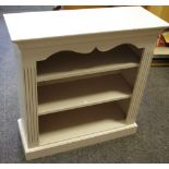 An early 20th century painted bookcase, three shelves, fluted to frieze, c. 1940.