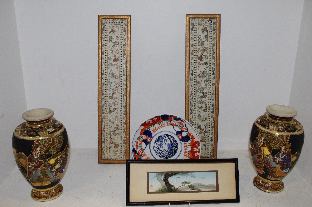 A pair of 19th century Chinese embroided sleeve panels c.